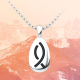 Fisher Sterling Silver Pendant on 18 inch chain with orange mountain background 