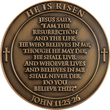 Back: Crosses, with the text "He is risen" / "Jesus said, "I am the resurrection and the life. He who believes in me, though he may die, he shall live. And whoever lives and believes in me shall never die. Do you believe this?" / "John 11:25-26"