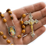 Olive Wood Rosary with Divine Mercy of Jesus Oval Medal in hand