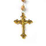 Close-up showing the detail of the INRI crucifix cross pendant