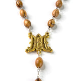 Close-up showing the detail of the miraculous medal