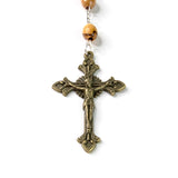 Close-up showing the detail of the INRI crucifix cross pendant