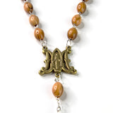 Close-up showing the detail of the miraculous medal