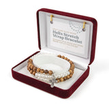 Helix Stretch Wrap Bracelet with Grouped Olive Wood and White Beads and Cross Dangle in Velvet Box