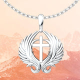 Angel Wings Cross Sterling Silver Pendant with orange mountain background