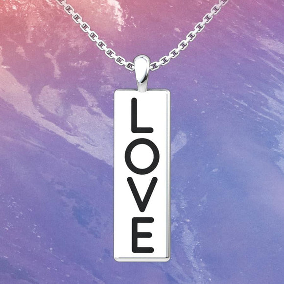  Love Conquers All Sterling Silver Pendant with an 18 inch with a marble background