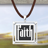 Men's Faith Sterling Silver Pendant with suede cord and a nature background 