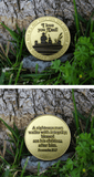 Front and back of Father's Appreciation Gold Plated Challenge Coin against a tree in the grass
