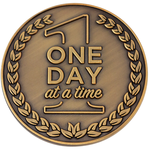 Front: Text, "One day at a time"