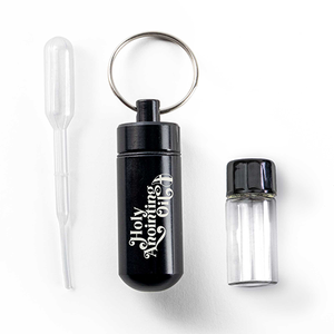 Oil Vial Keyring showing keyring vial holder, vial and eyedropper