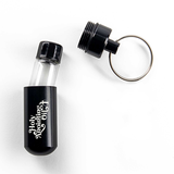 Oil Vial Keyring showing open keyring vial holder and vial in holder