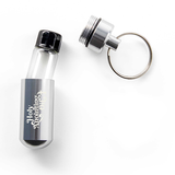 Oil Vial Keyring showing open keyring vial holder with vial inside