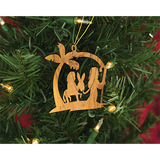 holy land journey of mary and joseph holiday ornament hanging on a christmas tree