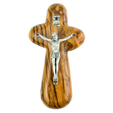 front of olive wood crucifix holding cross with inri plaque